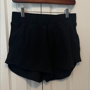 Black athletic shorts. No lining. Size M